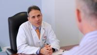 Doctor talks to patient.